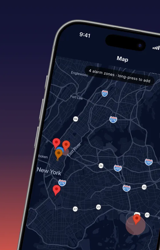 Map of New York with four alarm zone pins and a banner: 4 alarm zones, long-press to add